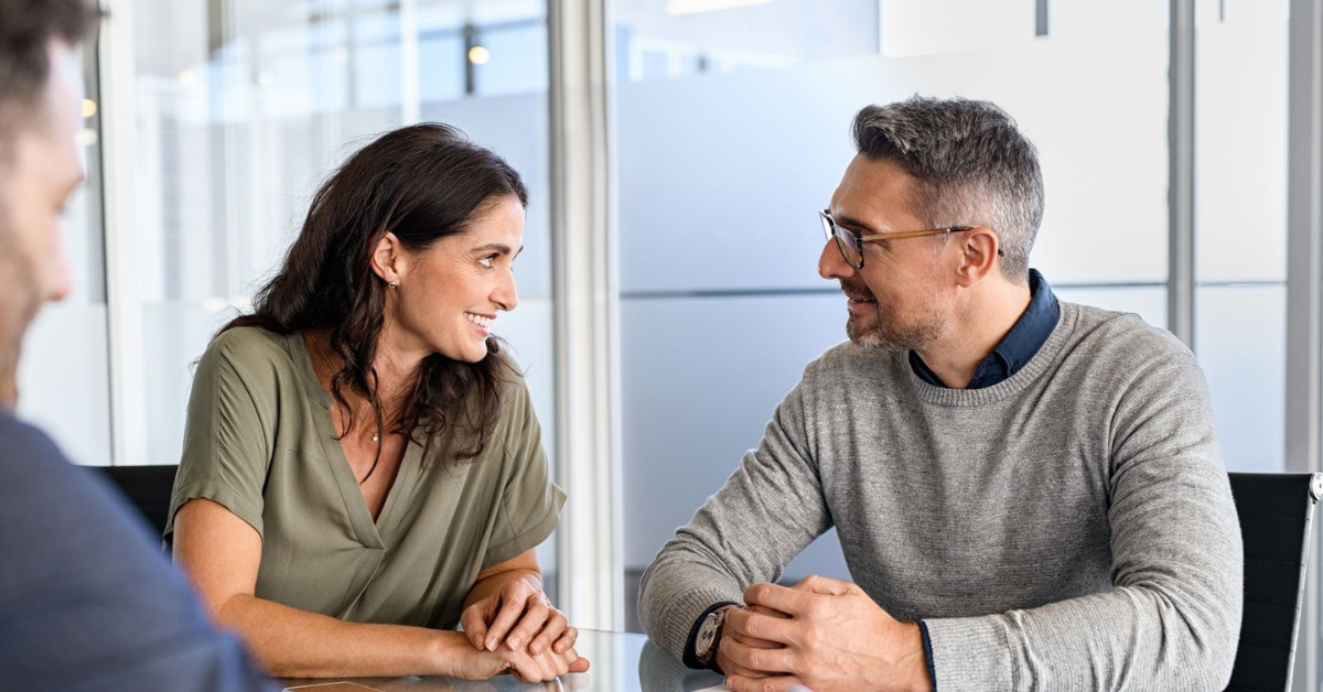 Bingham-Law-Group-Business Structure-Featured Couple Smiling at Eachother