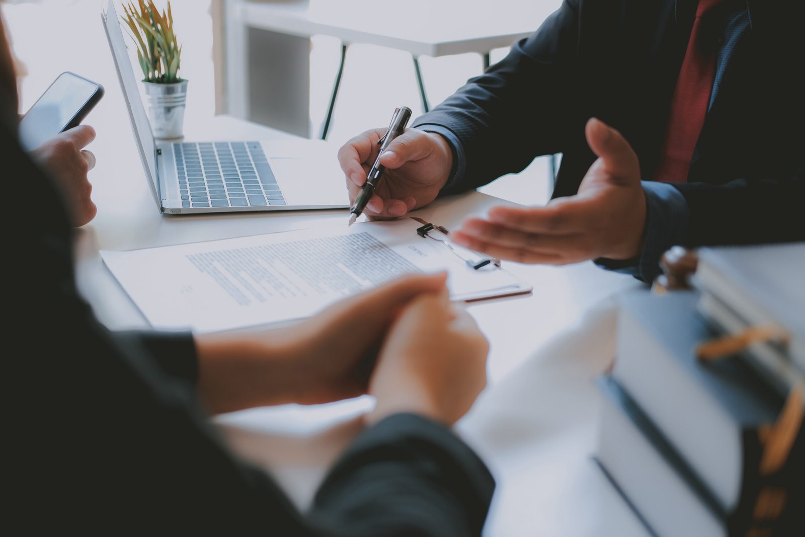 Lawyer,Insurance,Broker,Consulting,Giving,Legal,Advice,To,Couple,Customer Bingham-Law-Group-faqs
