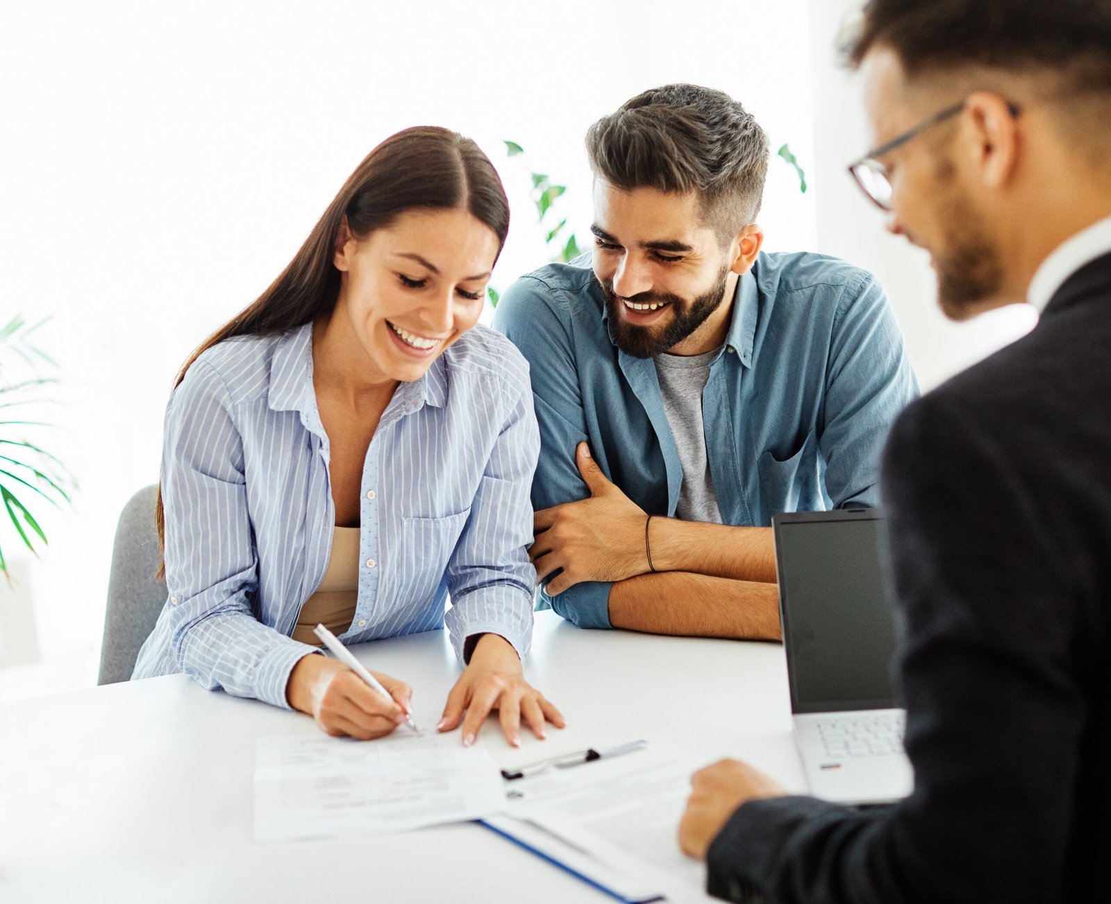 Bingham-Law-Group-Nampa-2 Couple Signing Attorney Papers