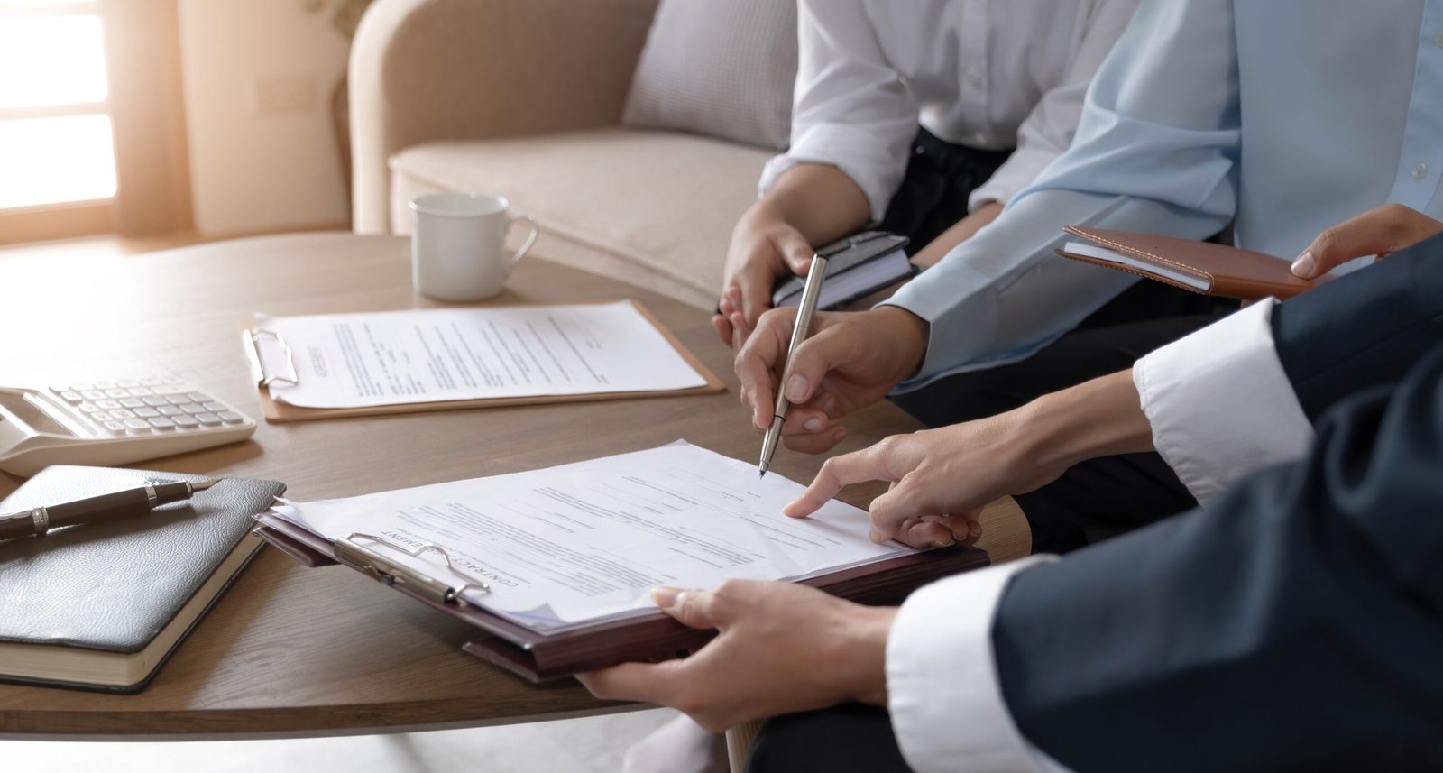 Bingham-Law-Group-Bountiful-4 Attorney and Client Signing Documents