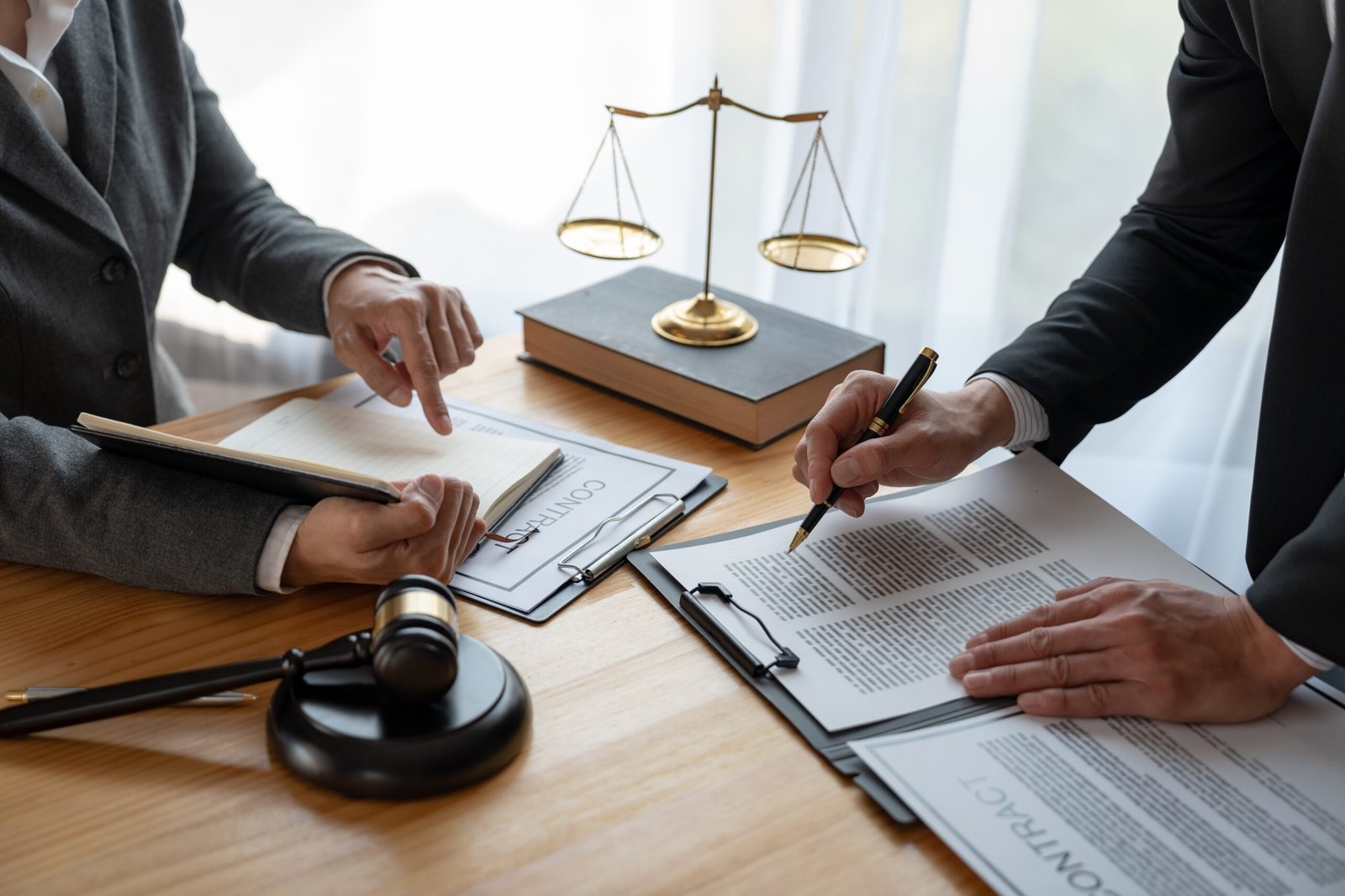 Two Attorneys Looking at Documents