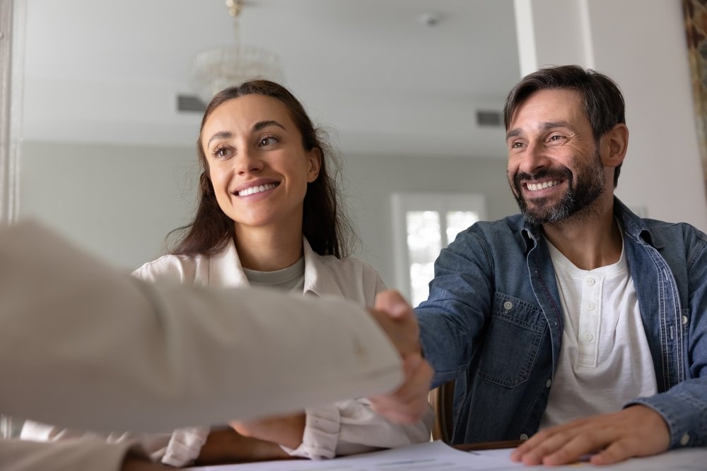 Sales,Manager,,Attorney,Or,Broker,Shaking,Hands,With,Clients,Start Bingham-Law-Group-faqs